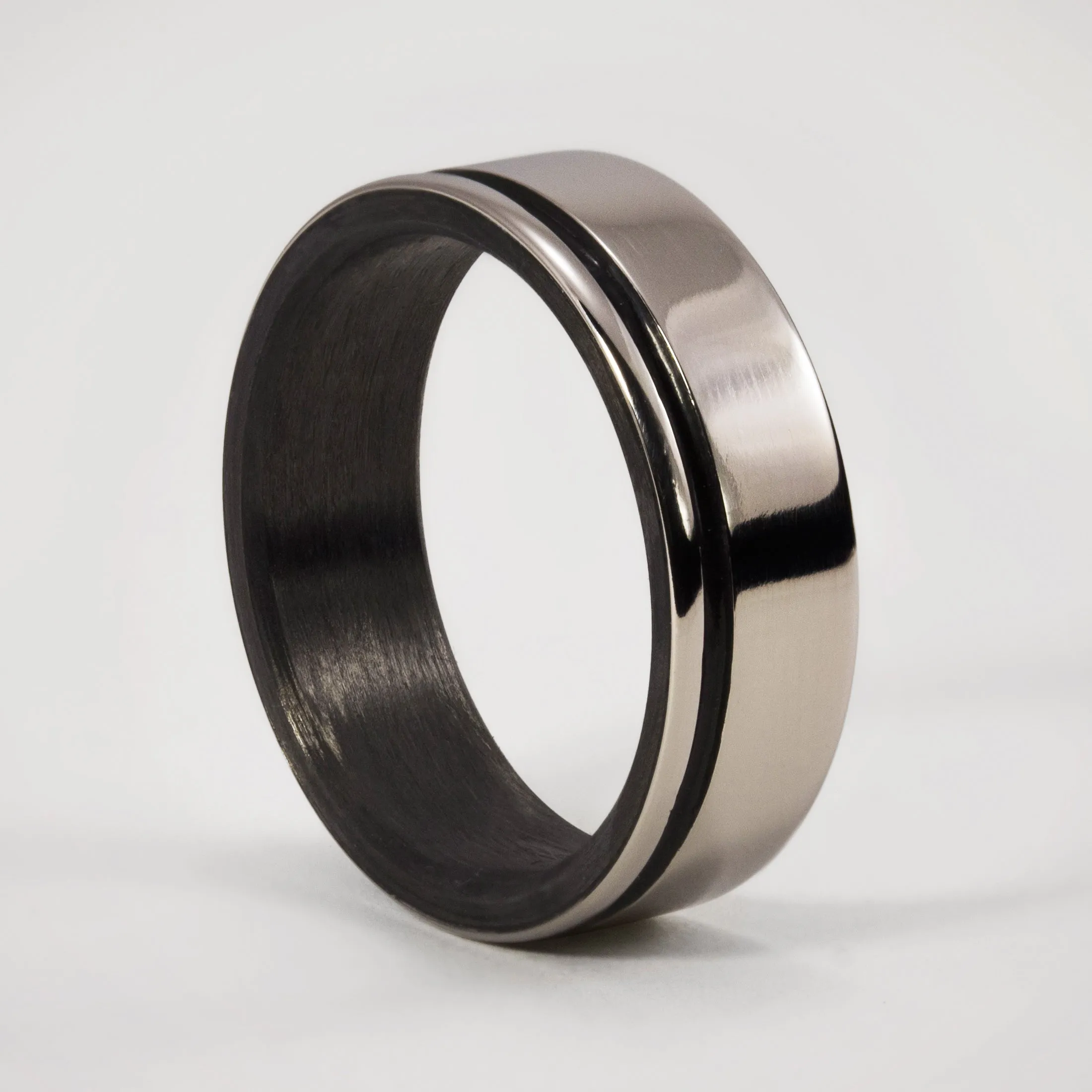 Polished titanium and carbon fiber men ring