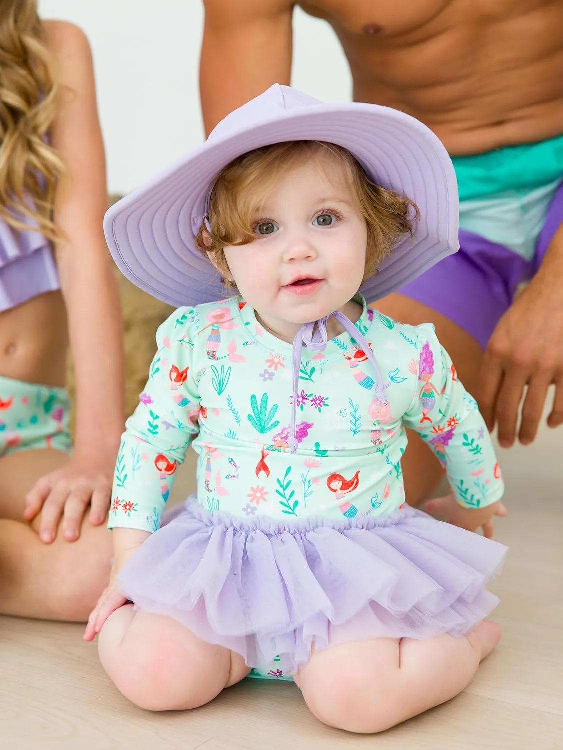 RuffleButts Baby Girls UPF 50  Sun Protection Tulle Skirted Long Sleeve One Piece Rash Guard Swimsuit