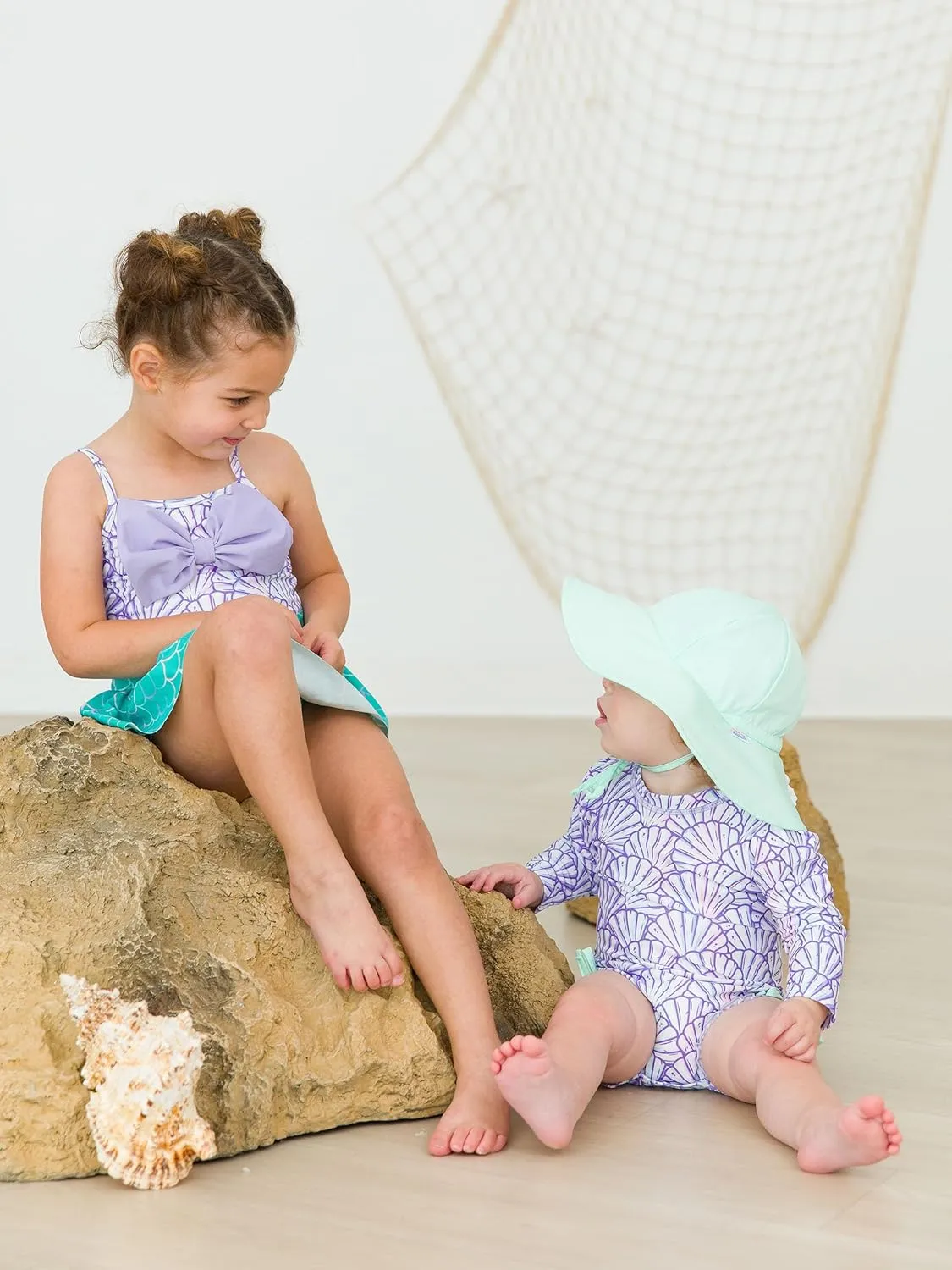 RuffleButts Girls UPF50  Sun Protection Princess Sleeveless One Piece Swimsuit